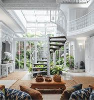 Spiral staircase inside a living room
